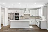 Picture of model home and not of actual home being built.  Colors, selections, and options may vary.  Gourmet kitchen and gas is optional in community