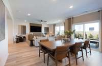 ***Photo is from a brand new Rosella Model home*** Located right off the Kitchen and Dining spaces off the rear of the home will be a covered patio. This is the perfect space to relax and enjoy your morning coffee.