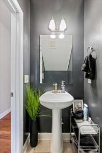 Half Bath is conveniently located on the first floor for guests.