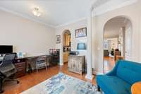 Arched Doorways and Column create a stunning entry.