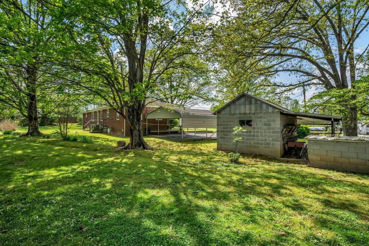Back of block building.  Pumphouse is the corner of the property.Well in pump house w/outside faucet. All worked the last time it was used. Great for watering yard or garden.