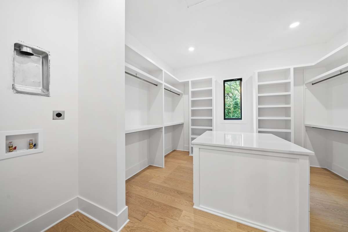Primary Suite Closet with space for Washer/Dryer