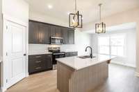 Kitchen with eat in dining area~