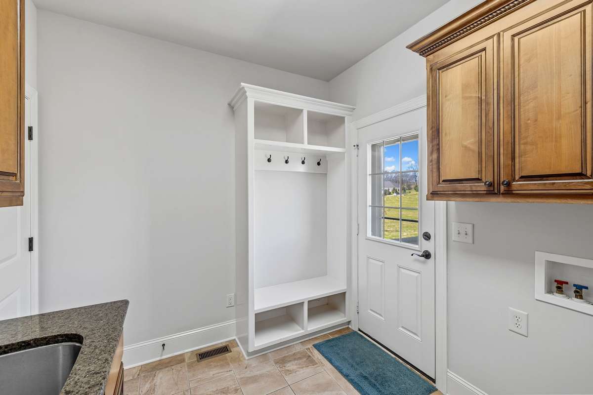 The Utility Room has an exterior door which provides a practical entry point from the exterior.  Ideal for coats and shoes.