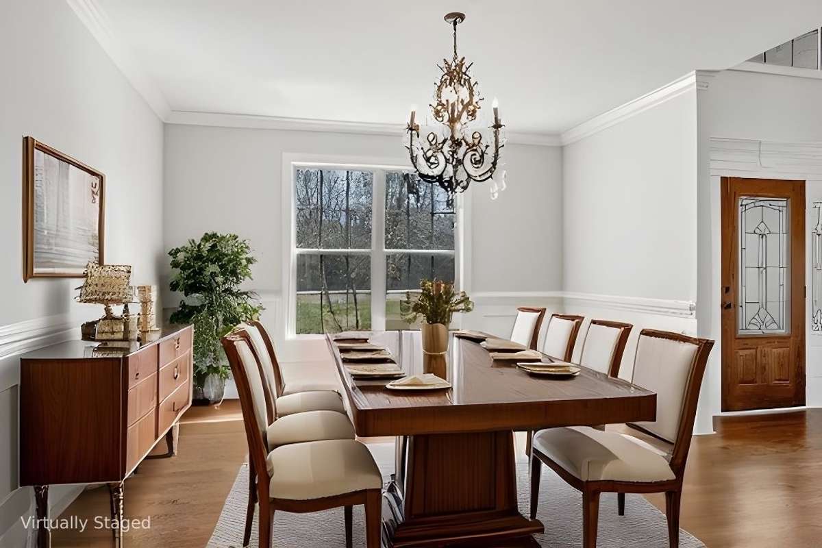 Virtually staged to show another option for Dining Room on Main Level.