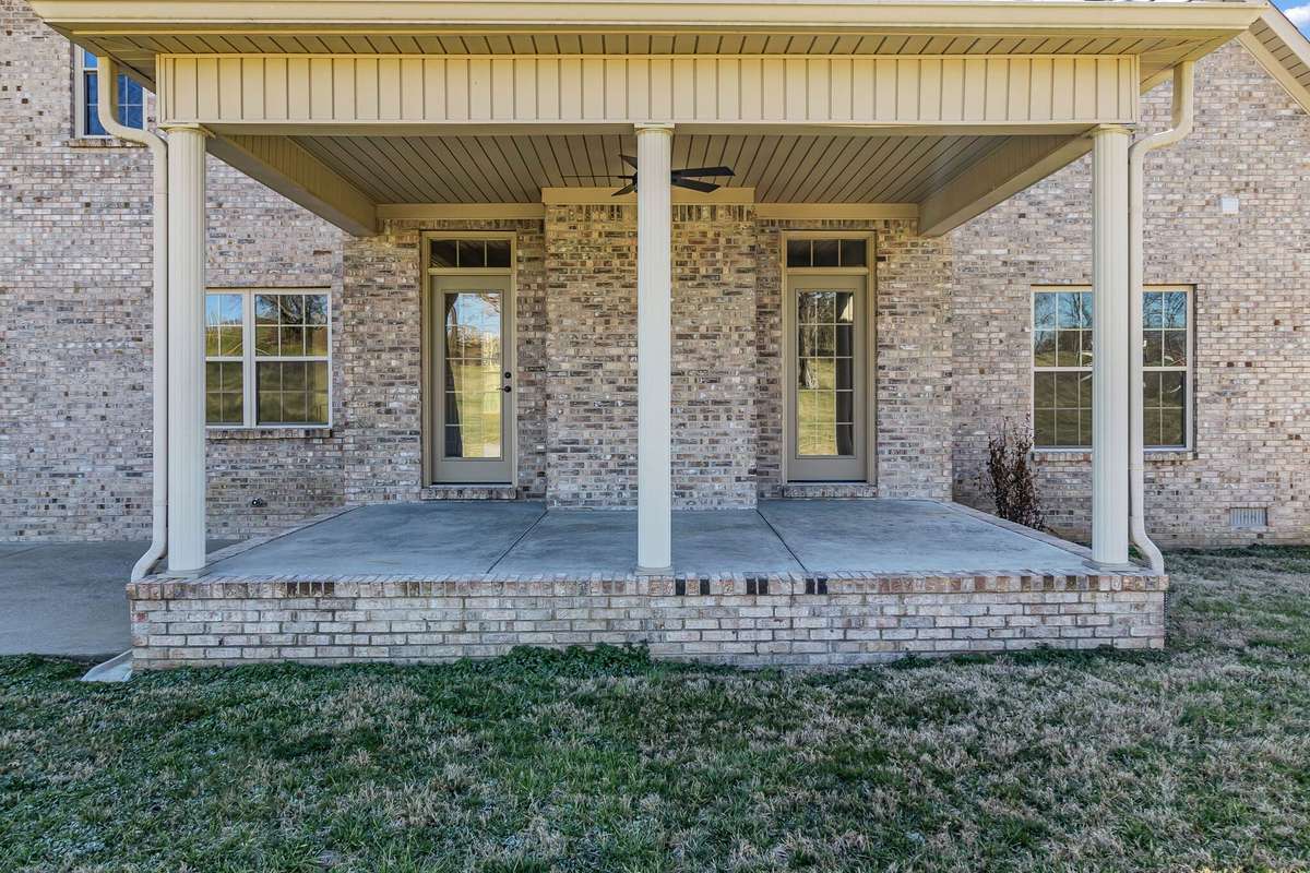 Enjoy outdoor living on the large covered back porch.  Perfect for summer cookouts and entertaining guests.
