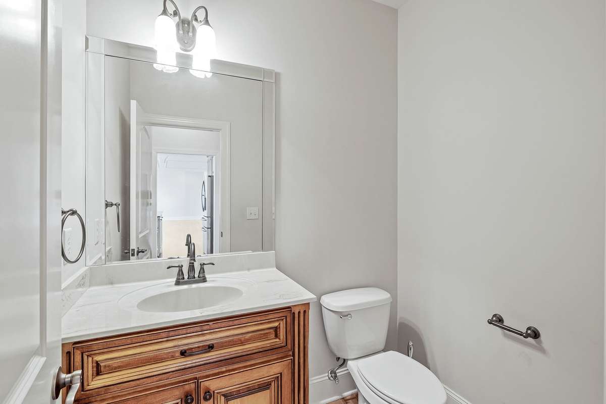 The half Bath is convenient for guests All vanities are custom made.
.