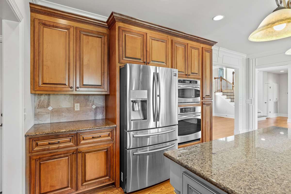 The home is equipped with top of the line stainless steel refrigerator, microwave and built-in large oven.