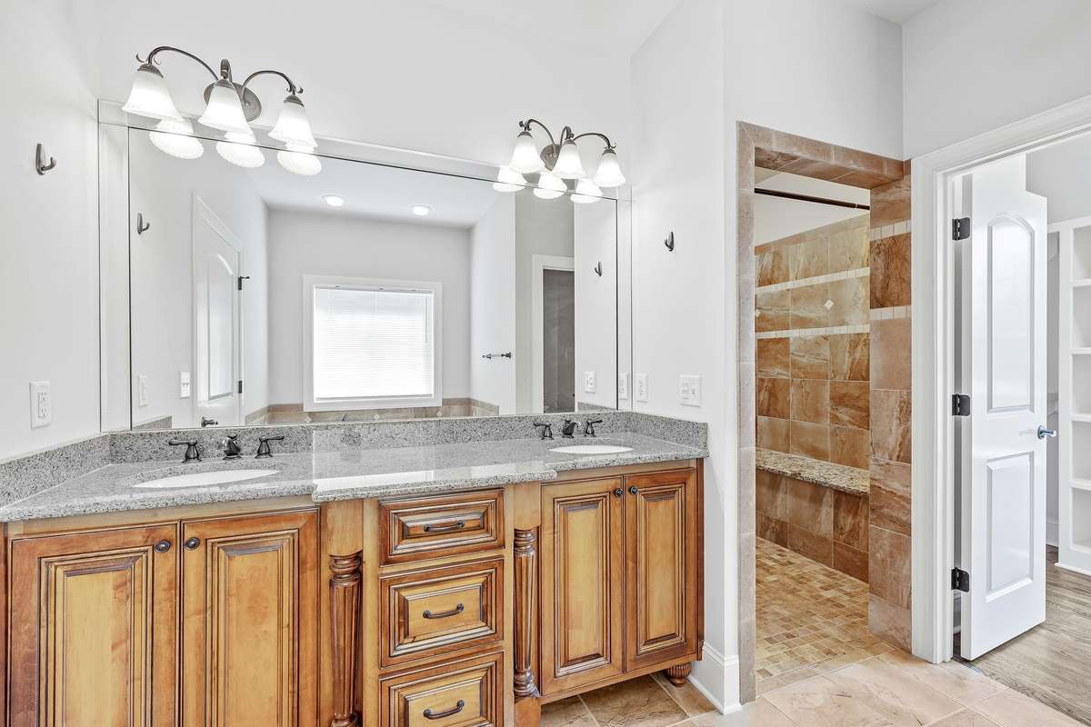 The luxurious ensuite Bathroom offers a custom double vanity, large tub to relax after a stressful day.  Super size closet will hold a massive amount of clothing and storagel