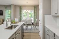 Model home shown with 2ft extension and country kitchen - see floorplan for details.