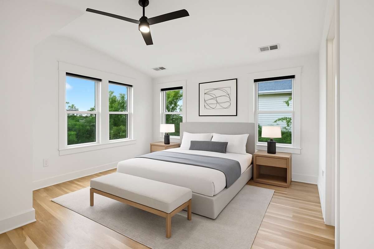 Primary Ensuite with Vaulted Ceiling & Ceiling Fan. This photo is virtually staged