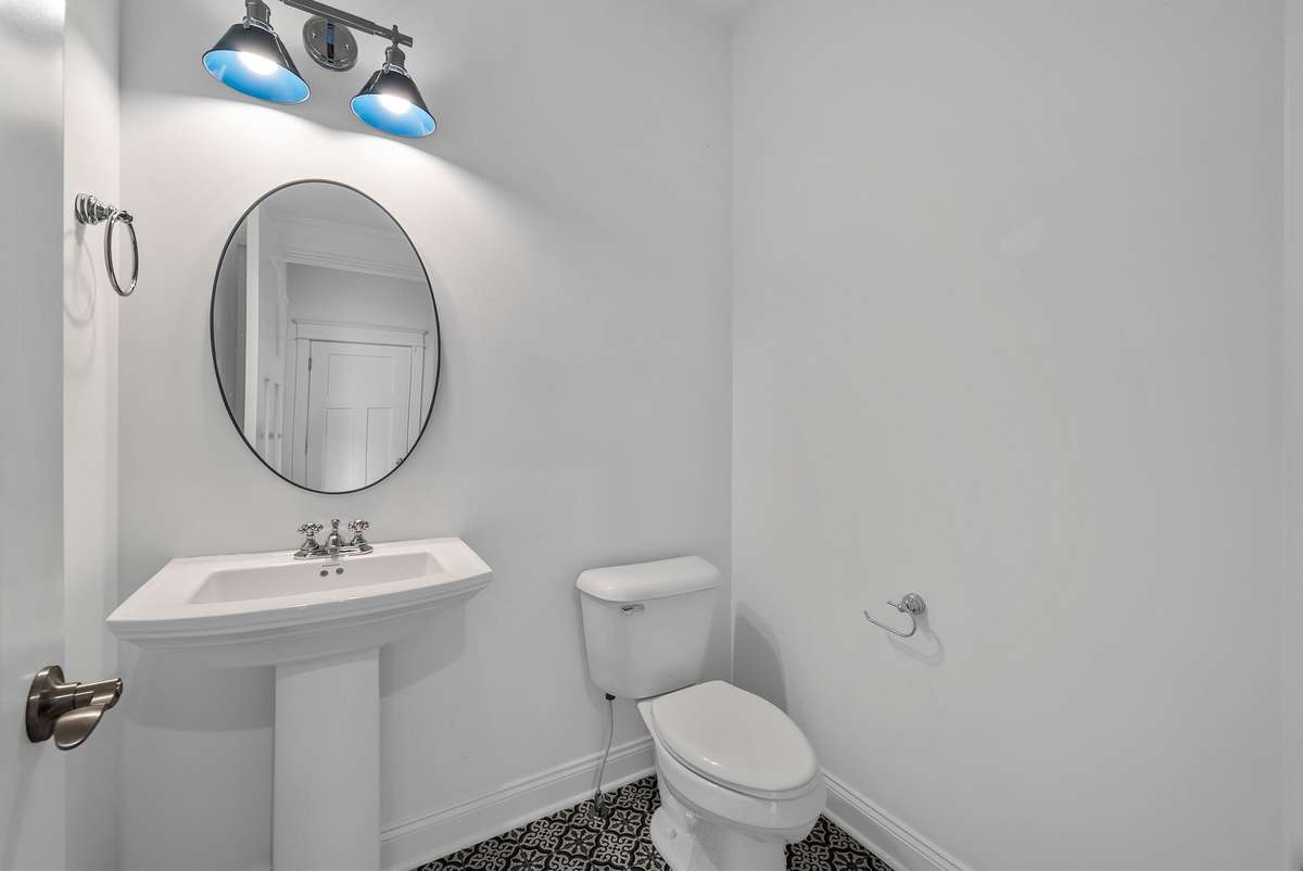 Half bath, conveniently located on the first floor