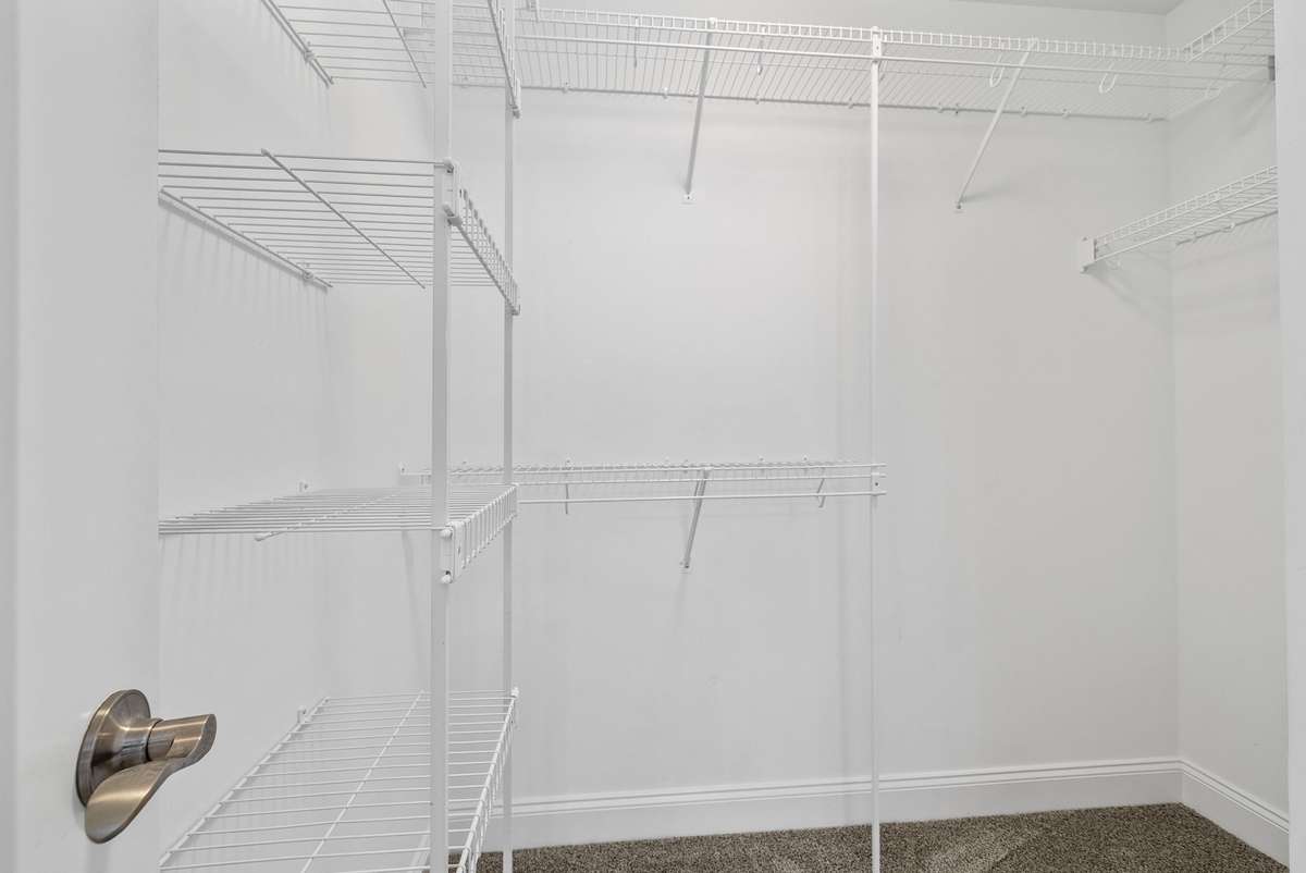 Large walk-in closet in primary bedroom