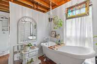 Clawfoot tub - separate from the shower and toilet