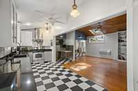 Large kitchen with room for a huge dining table and open to the cozy living room