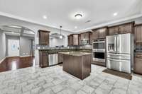 Beautiful Kitchen with Granite Countertops, French Door Refrigerator & a Walk-in Pantry!