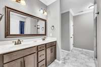 Primary Bathroom w/ a Double Vanity, Jetted Tub, Tile Shower & Walk-in Closet!