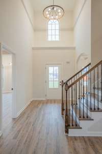 2 Story Entry Foyer with an Elegant Chandelier!