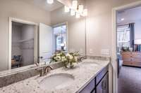 Double vanities in your primary suite with large walk-in closet. Quartz countertops included