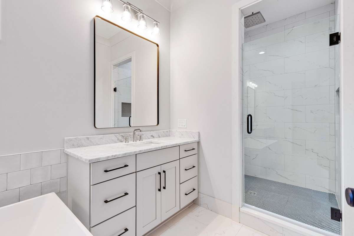 This spacious and modern bathroom is designed for ultimate comfort and style.  6369 Alamo Pl  Nashville, TN