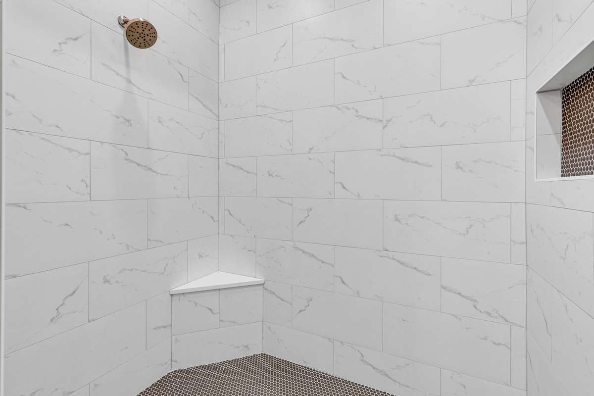 A massive walk-in shower with a glass door offers a luxurious experience. 6369 Alamo Pl  Nashville, TN