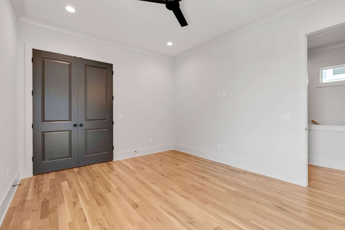 The second bedroom has recessed lighting, the same light colored hardwoods, and a ceiling fan! 6369 Alamo Pl  Nashville, TN