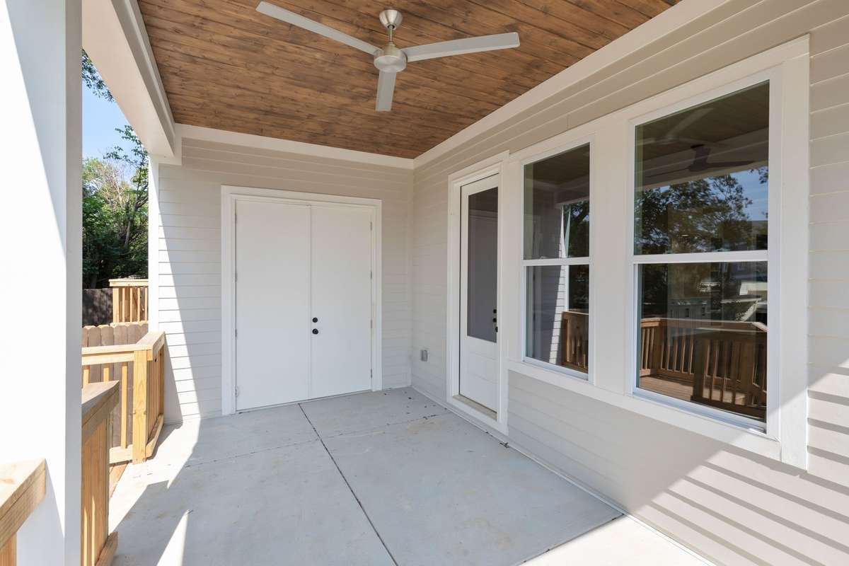 The covered patio is perfect for entertaining, featuring a storage closet and an overhead ceiling fan for added comfort. 6369 Alamo Pl  Nashville, TN