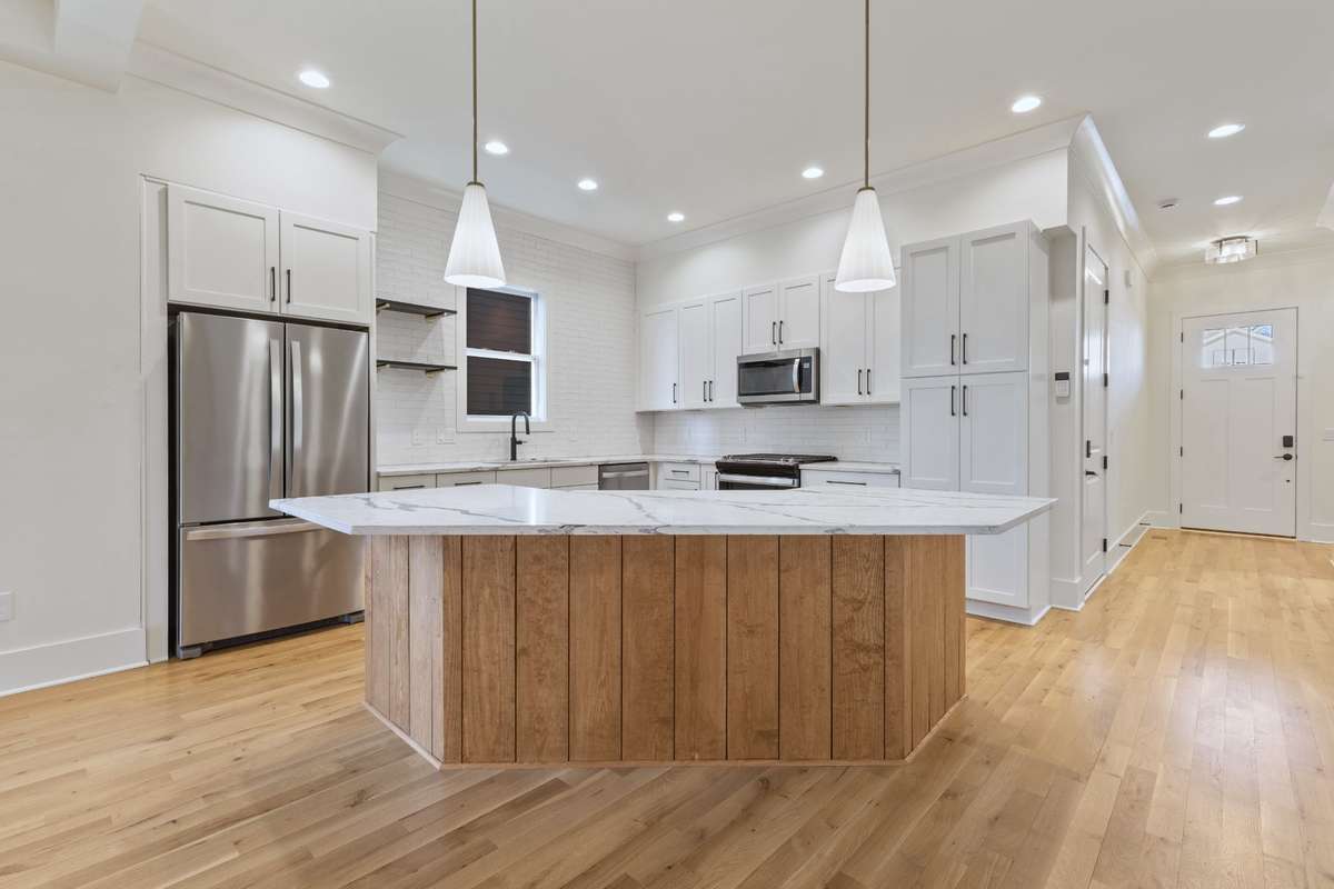 Your kitchen features crown molding, recessed lighting, & hardwood flooring. 6371 Alamo Pl Nashville TN 37209