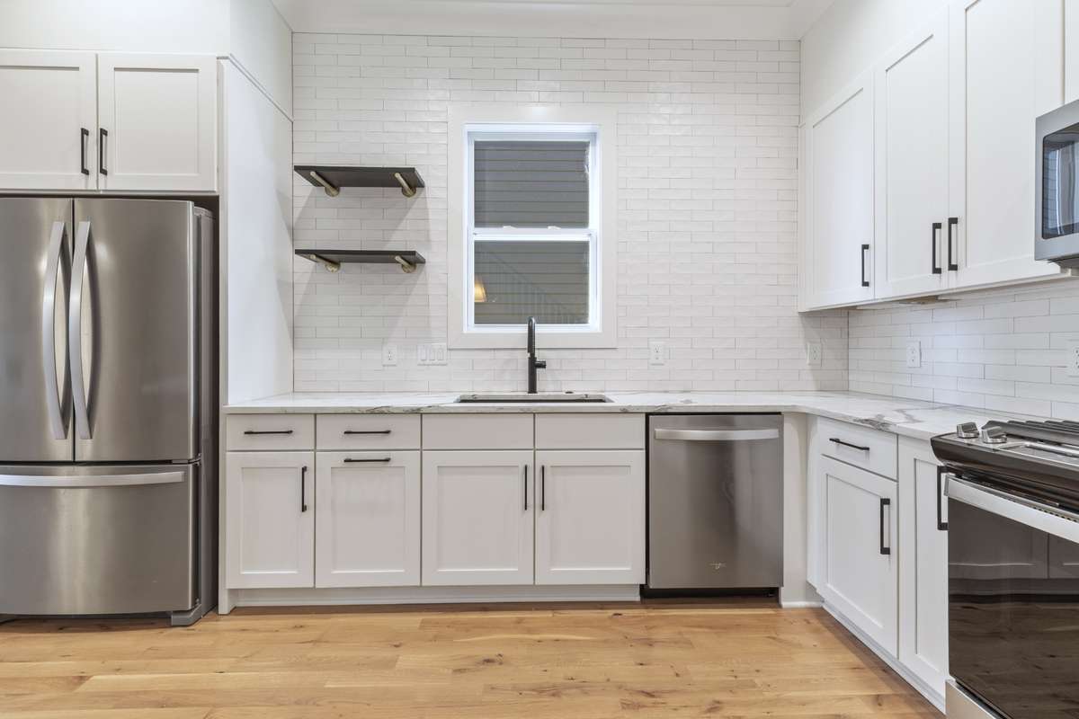 Your kitchen also comes equipped with SS appliances & beautiful tile backsplash & accent wall. 6371 Alamo Pl Nashville TN 37209