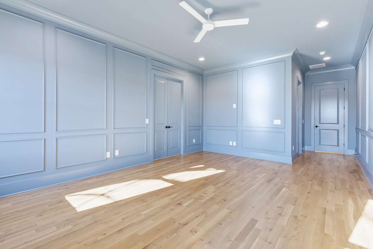 Another view of your large primary suite with recessed lighting, ceiling fan, & private bathroom. 6371 Alamo Pl Nashville TN 37209