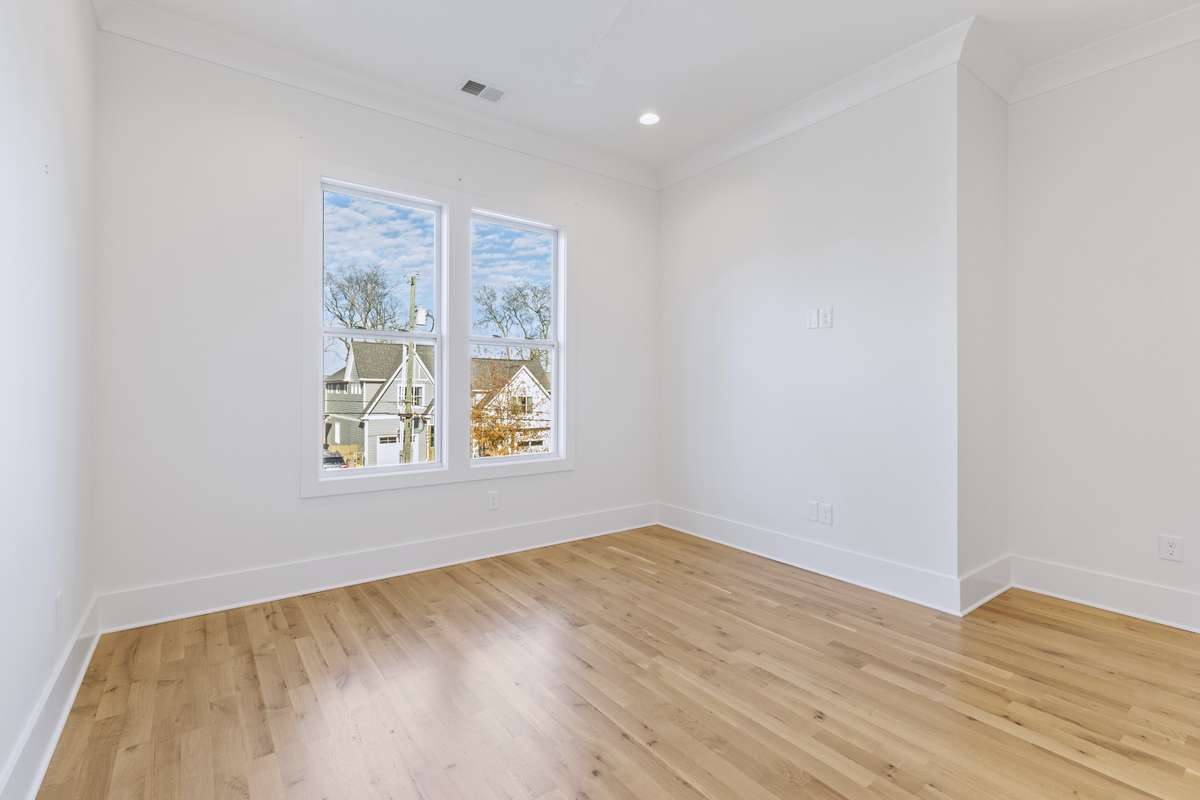 Third bedroom with double window, crown molding, & recessed lights. 6371 Alamo Pl Nashville TN 37209