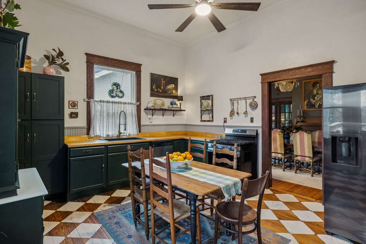 The kitchen design provides a spacious, less formal space for entertaining and gathering.