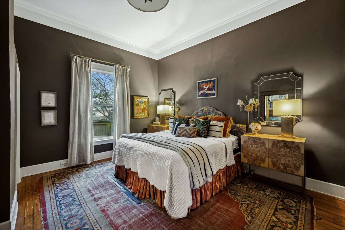 Primary bedroom, located on the main level in the back of the home