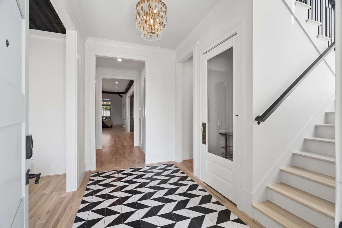 Front entry with decorative tile flooring