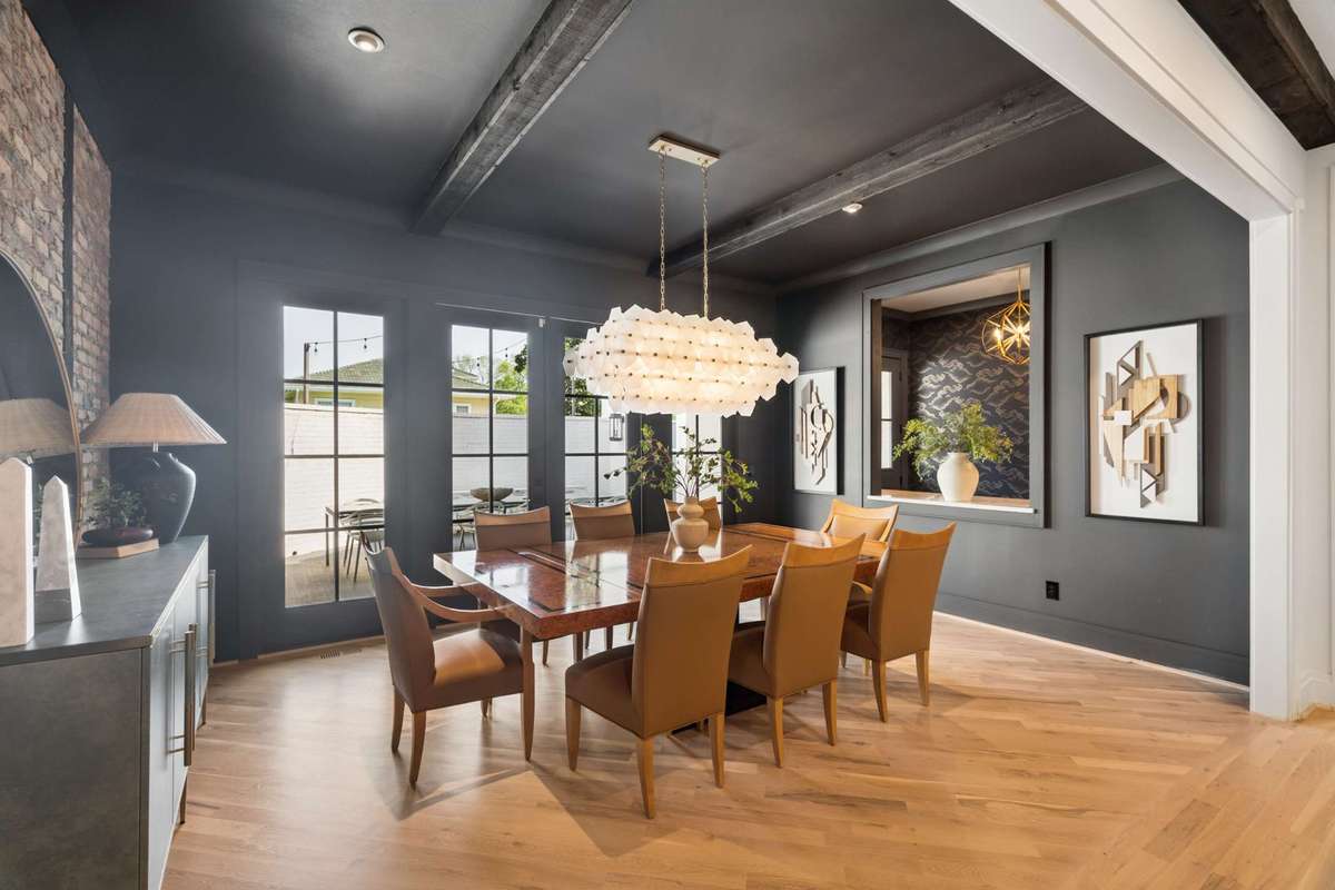 Formal dining space opens to kitchen and gathering rooms