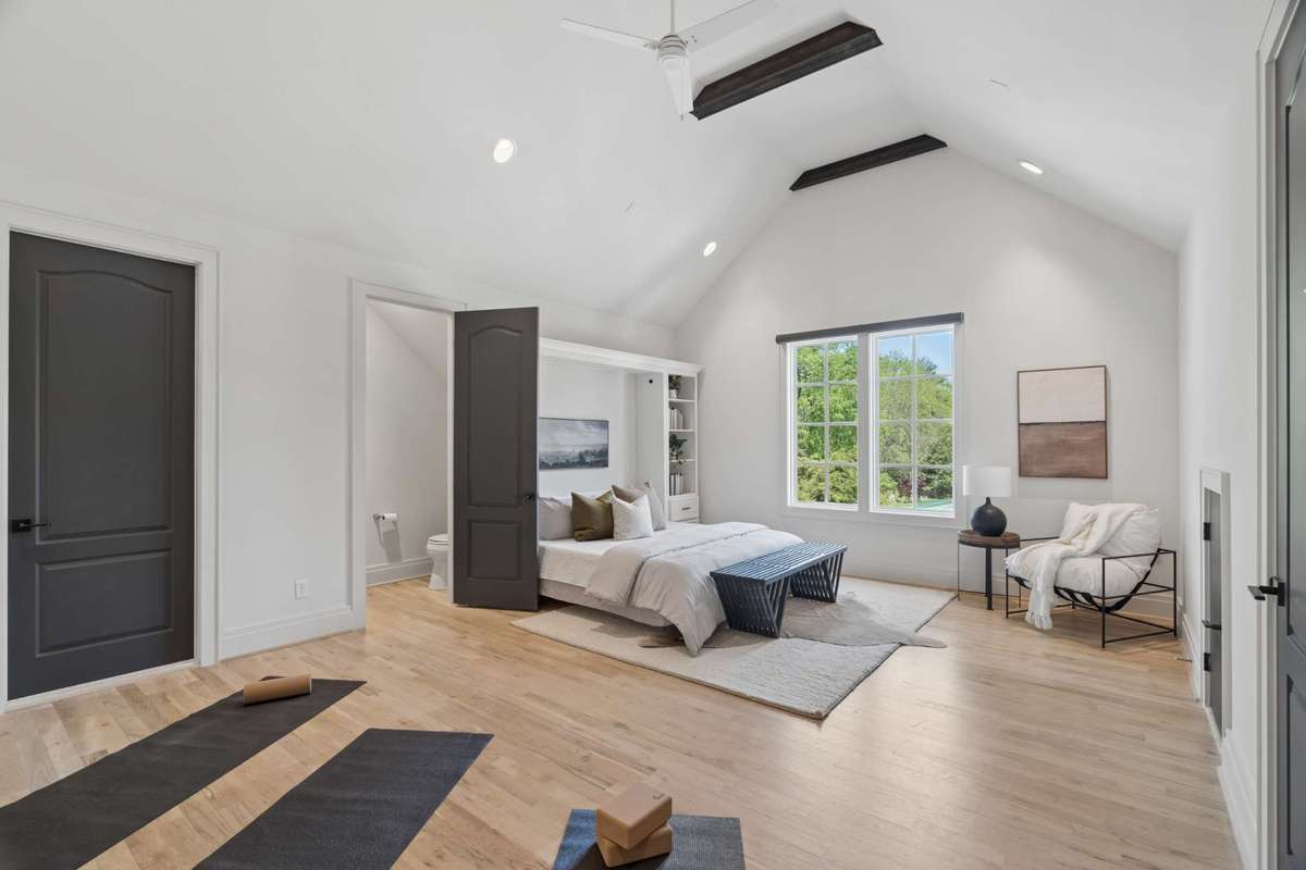 Second upstairs bonus room with vaulted ceilings, Murphy bed and 1/2 bath