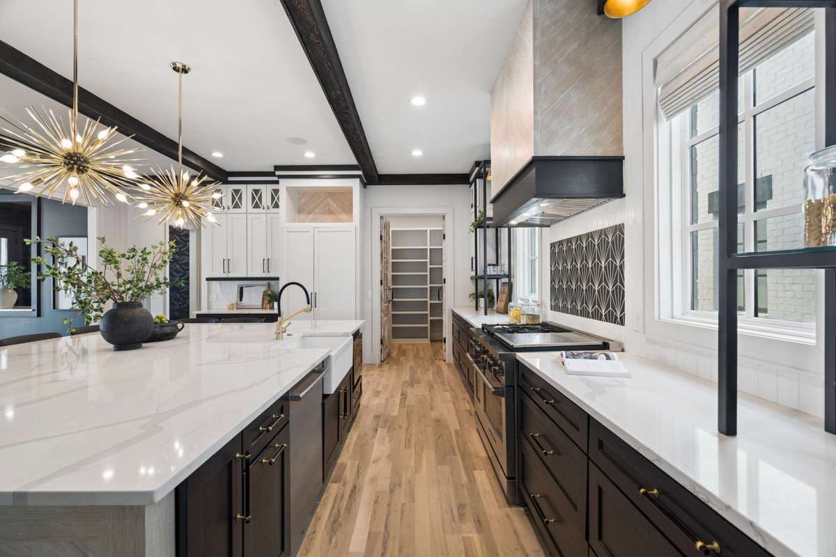 The kitchen features a large walk-in pantry