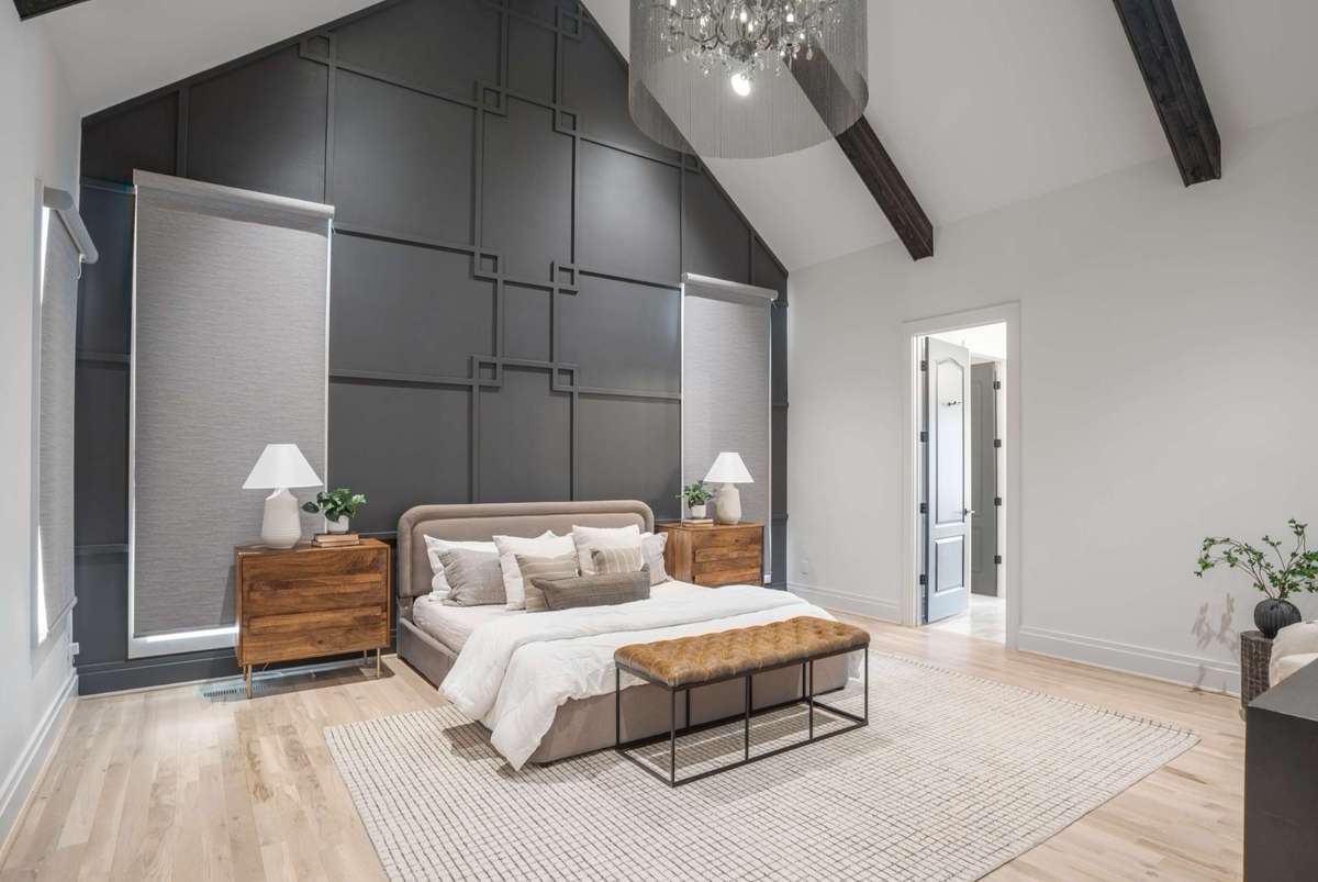 Spacious Primary Bedroom on first floor with vaulted ceilings