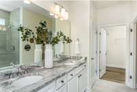 Photo of Contour Model Home's Owner's Bathroom. Actual colors & selections may vary.