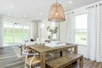 Photo of Contour Model Home's Cafe & Gathering Room. Actual colors & selections may vary.