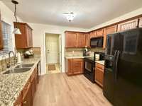 Plenty of countertops and cabinet space for the family chef! Refrigerator stays