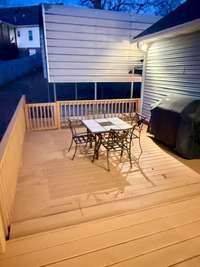 Second part of the deck overlooking the covered carport