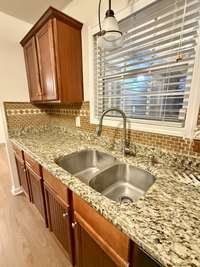 Upgraded faucet with stainless sink