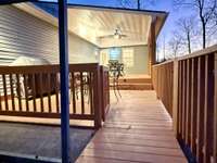 Extra large multilevel back deck overlooking expansive backyard with beautiful sunrise and sunset views