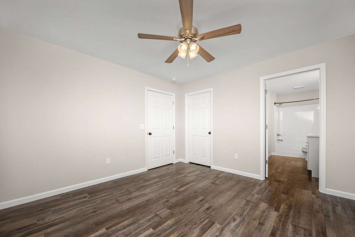 Primary bedroom with walk in closet.