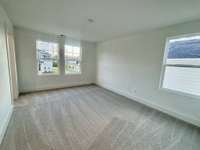 Bed 3 is full of natural light and has a walk in closet