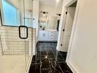 Primary bath has a separate shower/tub