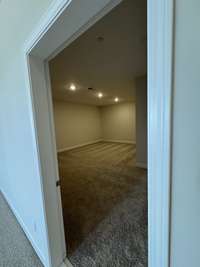 Finished Media room off the rec room. This is the perfect room for watching movies or possible gym/workout room or even an office.