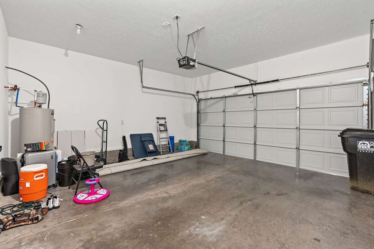 Two car garage with brand new garage door.