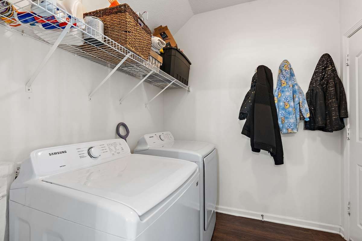Large, walk-in laundry/utility room.